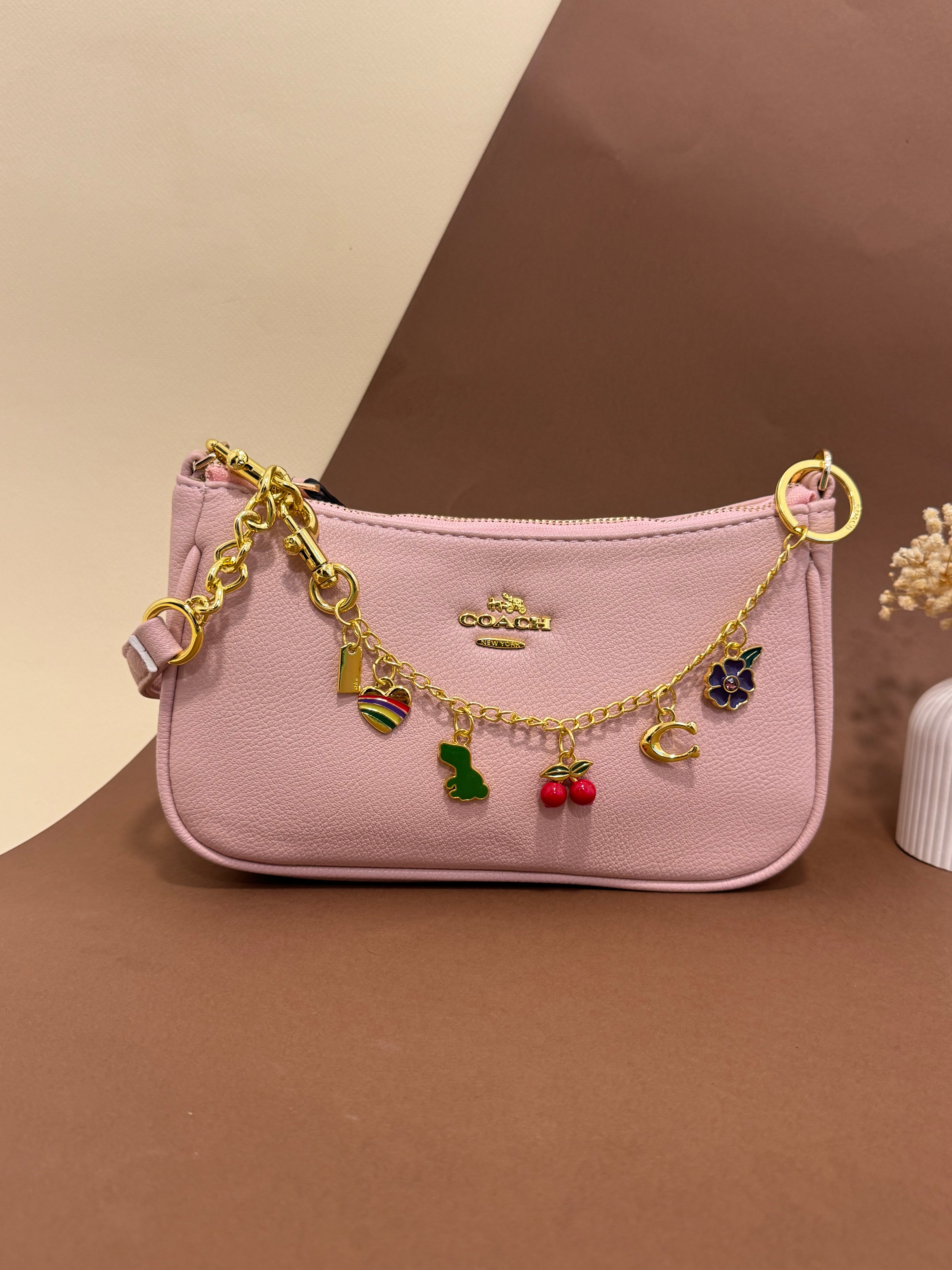 Baby pink coach