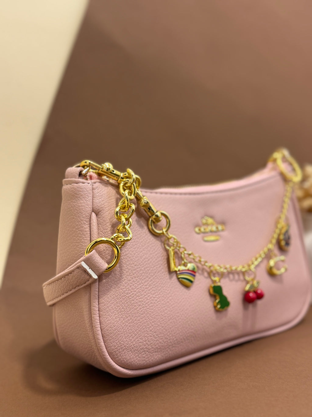 Baby pink coach