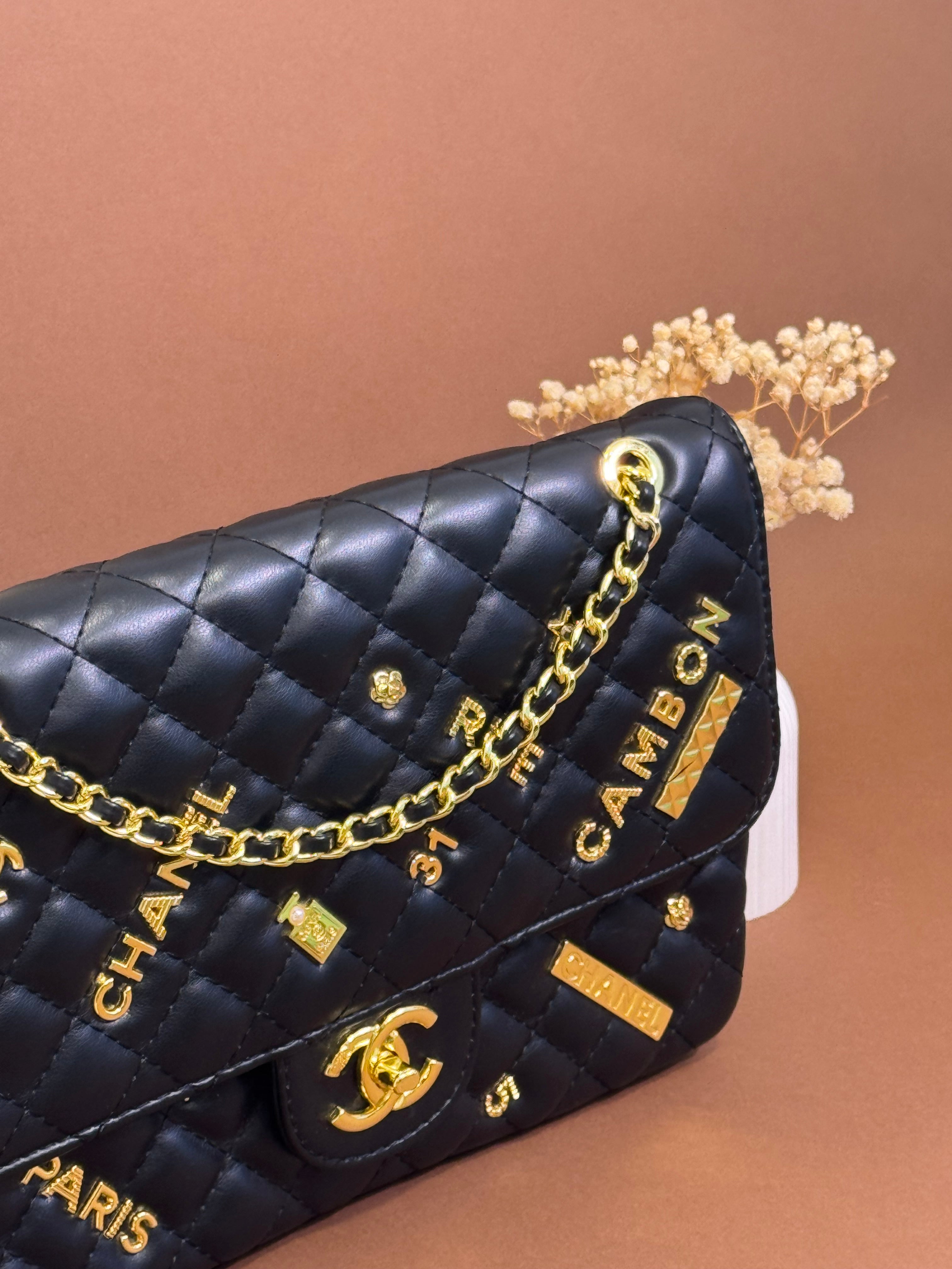 Black quilted chain shoulder bag