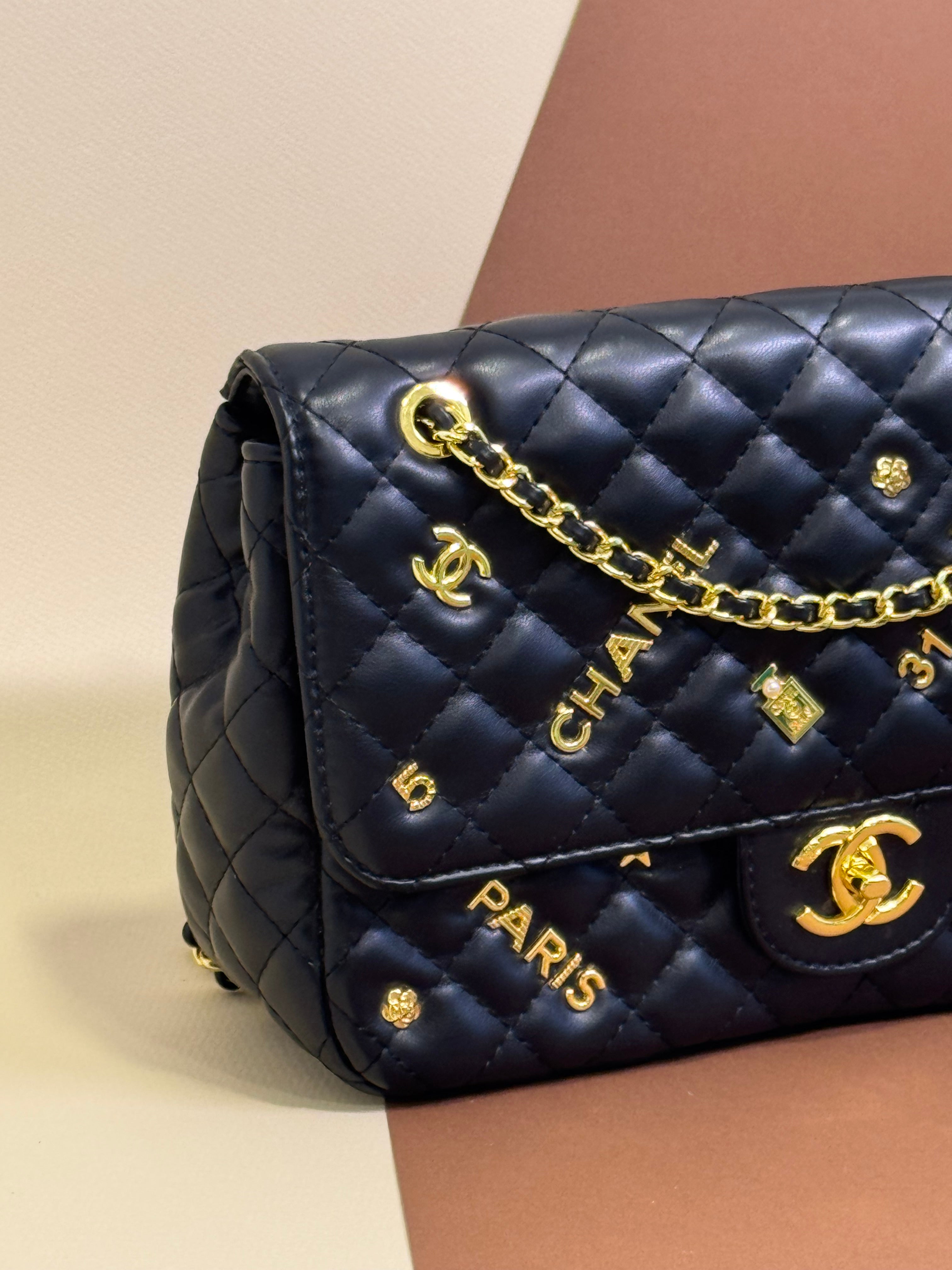 Black quilted chain shoulder bag
