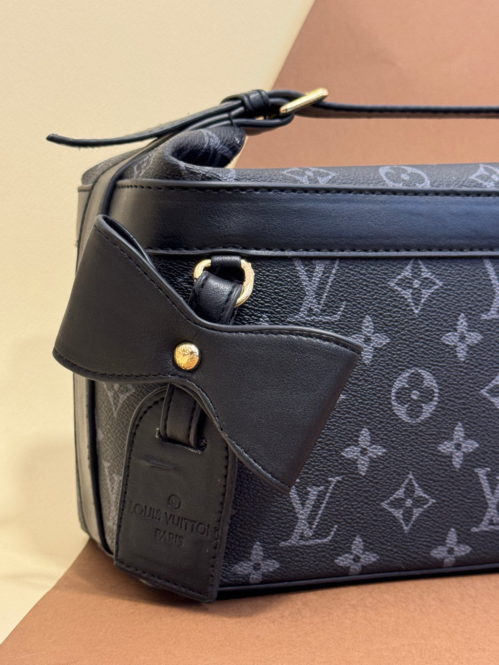 LV strap bag