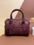 Burgandy coach bag