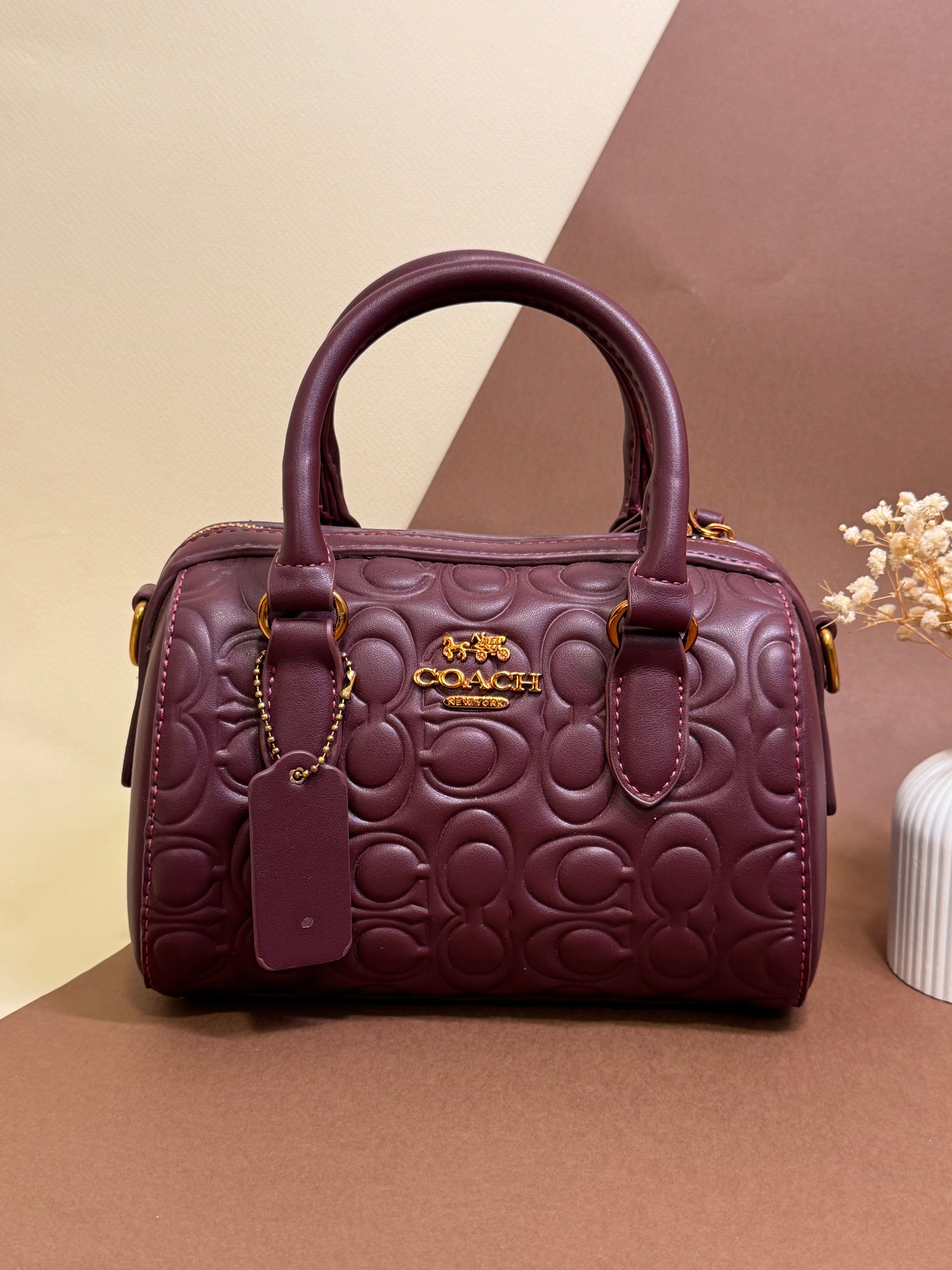 Burgandy coach bag